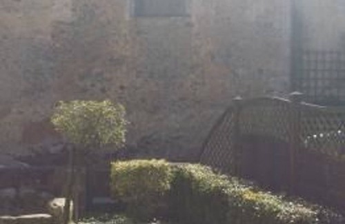 Crannes-en-Champagne Cottage | Historic 15th Century Home with Fireplace, Garden, and Modern Amenities