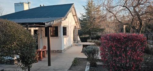 Huerta Grande Ski Chalet | Hogar Lejano Cabañas y Río