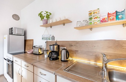 Sundern Apartment | Holiday Apartment 'Sonnenblick Und Relax' with Private Terrace, Shared Garden and Wi-Fi