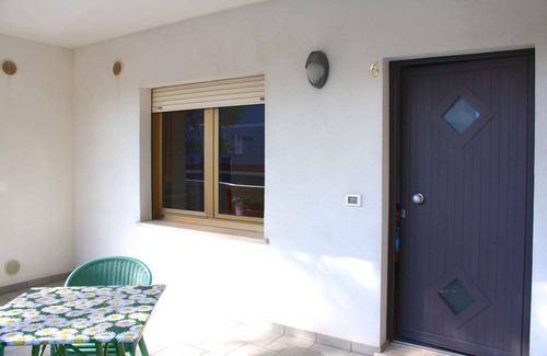 Lignano Sabbiadoro Apartment | Holiday apartment with terrace and air conditioning on the ground floor