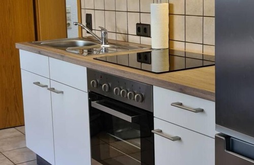 Balve Apartment | Holiday Apartment 'Zum Plauderbaum' with Private Terrace, Private Garden and Wi-Fi