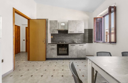 Arbus House | Holiday Home 'Arbus Aventino Centrale' with Private Terrace and Air Conditioning