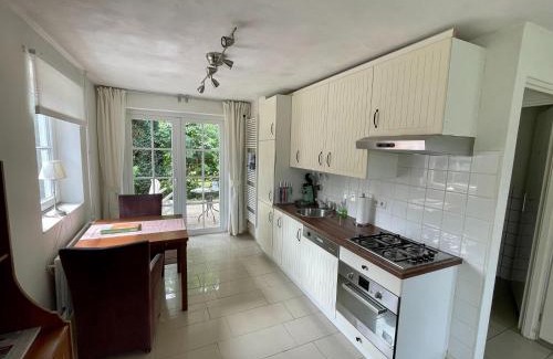 Spijk House | Holiday Home in Spijk with Meadow Views