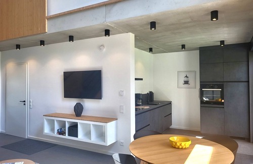 Muldestausee House | Holiday Home 'Schlossterrassen 8a' with Lake View, Private Terrace and Wi-Fi