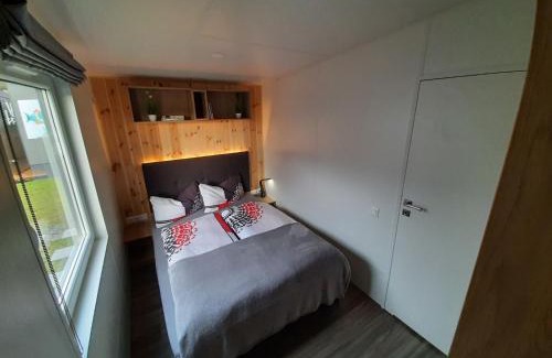 Wemding House | Holiday Home Tiny Haus am Waldsee by Interhome
