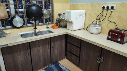 Permatang Tinggi House | Homestay Hassani