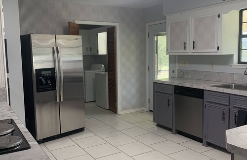 Gulfport House | Hometown Hideway: Family friendly with private pool and pond.