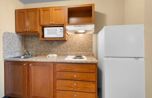 Pleasanton Hotel | Homey Space: Rustic Room Ideal for Extended Travel Stays
