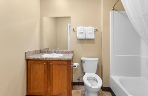 Pleasanton Hotel | Homey Space: Rustic Room Ideal for Extended Travel Stays