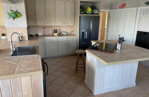 Hope Town House | Hope Town harbor period home with lighthouse view