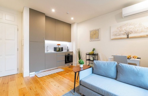 Guimaraes Apartment | HostWise - Bright and Cozy Flat w/Balcony