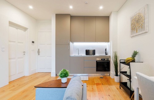 Guimaraes Apartment | HostWise - Bright and Cozy Flat w/Balcony