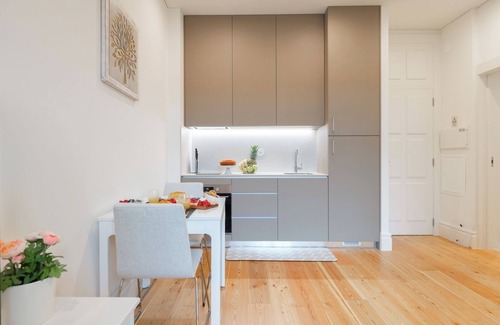 Guimaraes Apartment | HostWise - Bright Flat w/Balcony