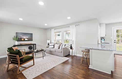 East Raleigh House | Hot Tub/Playground/Fire Pit/Backyard Retreat