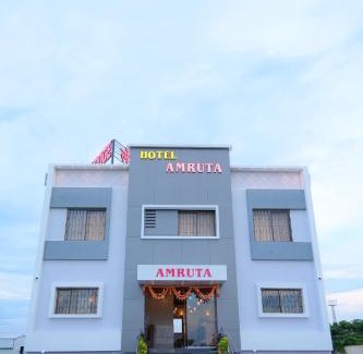 Madha Hotel | Hotel Amruta, Themburni, Madha