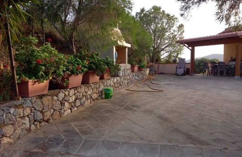 Fluminimaggiore Apartment | House on hillside with sea view 2 km from the beach.