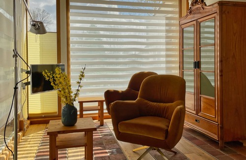 Paewesin House | House on the lakeshore with 360 ° view, with canoe, barely frequented swimming area
