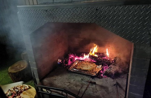 Gwandalan House | House with heated pool, fireplace and ev charger