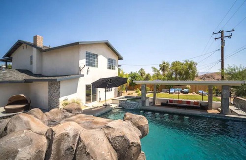 Cathedral City Cove House | Huge Home: Pool, Grotto, Water Slide, Swim Up Bar, Hot Tub, Fire Pit, Game Room