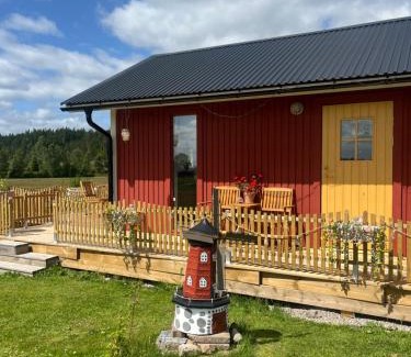 Gislaved House | Idyllisk stuga- fri elbilsladdning