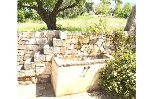 Ostuni House | Il Melograno, refined trullo with swimming pool in the Itria Valley surrounded by nature