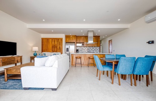 Libertad Apartment | Immaculate stay with stunning views, balcony, plus on-site pool & gym