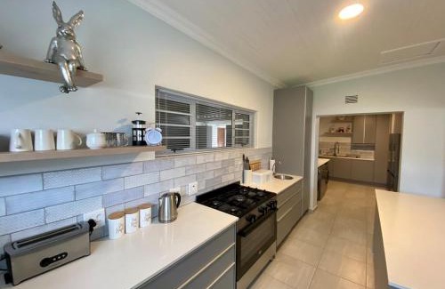 Paradise Beach House | In Harmony - Pet Friendly Modern Beach House