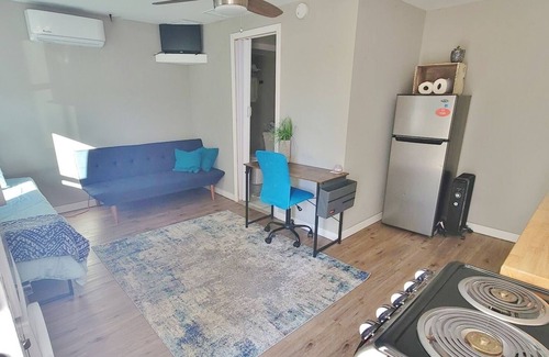 Norway Apartment | In unit laundry. AC, Modern Studio with desk and parking