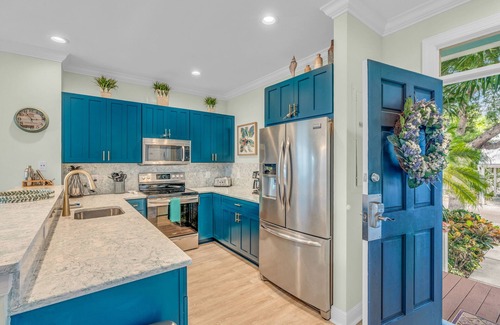 Indigo Reef Marina Homes House | Indigo Reef End Unit 3BR Waterfront Townhome w/Boat Slip, Pool, Gym & Views!