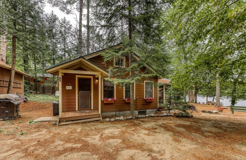 Adirondack House | Inviting lakefront house with dock, sandy beach & screened porch