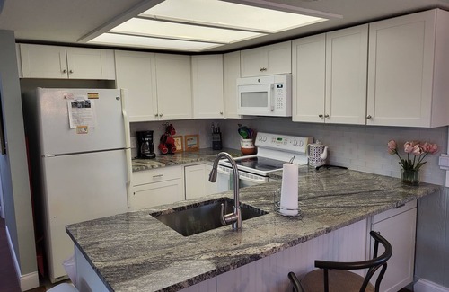 Independence Square Condo | IRB Island Cottages Upper Cottage 300 Gulf blvd. Indian Rocks Beach FL