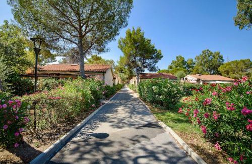 Piombino Apartment | ISA-Appartament plus with mezzanine, 4 beds, air conditioning and private outdoor area in Village with 6 swimming-pools