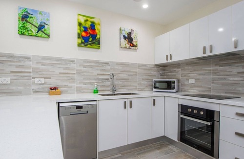 Arcadia Apartment | Island View Unit 2 - Renovated, modern and across the road from Geoffrey Bay Beach