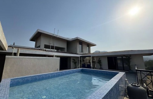 Alibaug Villa | Ivory House, Alibaug by Ebony Stays | Peaceful 4BHK Villa with Pool & Garden