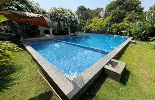 Alibaug Villa | Ivory House, Alibaug by Ebony Stays | Peaceful 4BHK Villa with Pool & Garden
