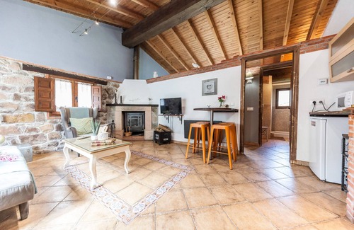 Santa Maria Apartment | Jacuzzi in bedroom with mountain views and fireplace