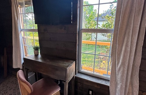 Greater East End Apartment | Jaw dropping, inner-loop bungalow with tiny home. A city retreat!