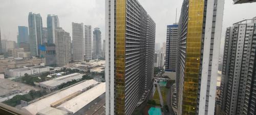 Wack-Wack Greenhills Apartment | JJMC HOMESTAY URBAN DECA EDSa