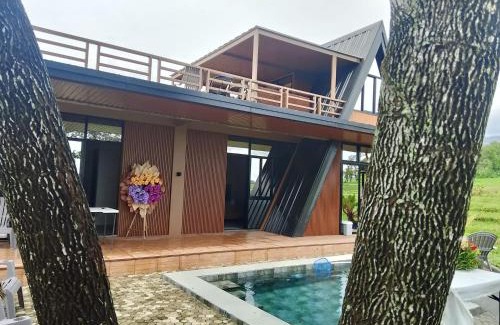 Canloan City House | Kalaparan Farm House by HiveRooms