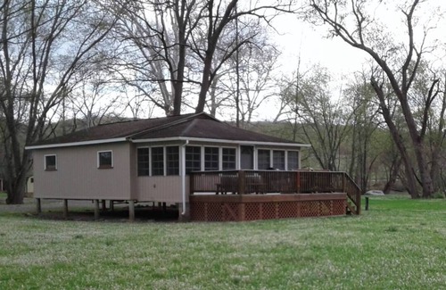 Fishertown Cottage | KD CottagesnPrivate 2-bedroom tan cottage on Dunnings Creek, in Bedford County