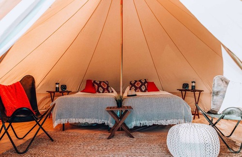 Valle House | King Tent w/Shared Bathroom - Find us among the juniper trees and the open sky.