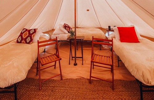 Valle House | King Tent w/Shared Bathroom - Find us among the juniper trees and the open sky.
