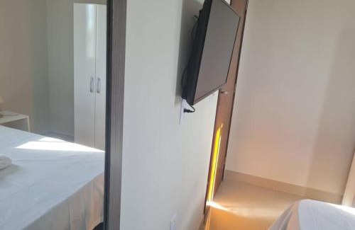 Vila Regina Apartment | Kitnet 301 centro linda vista por sol com tv smart e ar