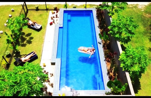 Muri House | Kokacabana Beach House - 3 bdrm House + Pool, 100% Beach Front @ Muri Beach!