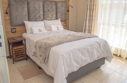 Welkom House | Kololo at 399 Guesthouse & Conference