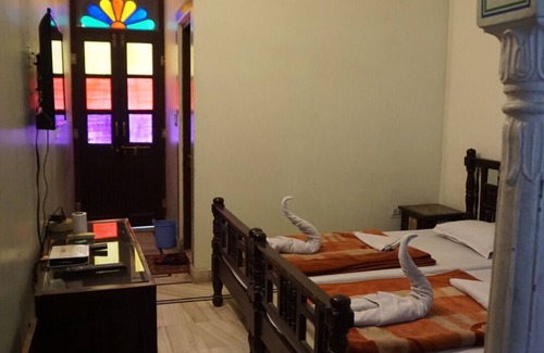 Bani Park House | Krishna Palace: A Private En-suite A/c Room in a Boutique Heritage Palace Home.