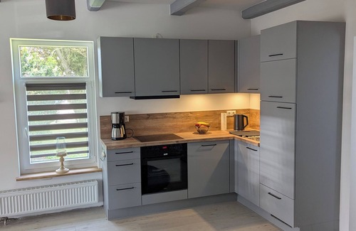 Neufeld House | Lütt achtern Diek