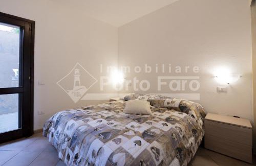 Capo d'Orso Villa | L324 - Bilocale con giardino e vista mare panoramica a Porto Mannu