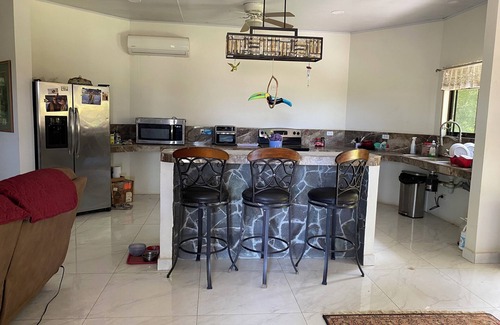 Barrio El Invu House | La casa encantada is a beautiful riverside jungle home only 4km from airport
