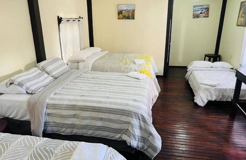 Corozal House | La Delphina Bed and Breakfast Bar and Grill Deluxe Family Room